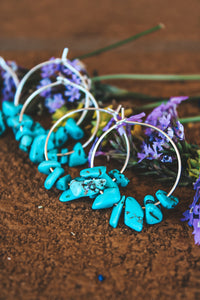 Turquoise rock hoops.