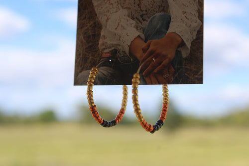 Brown beaded hoops